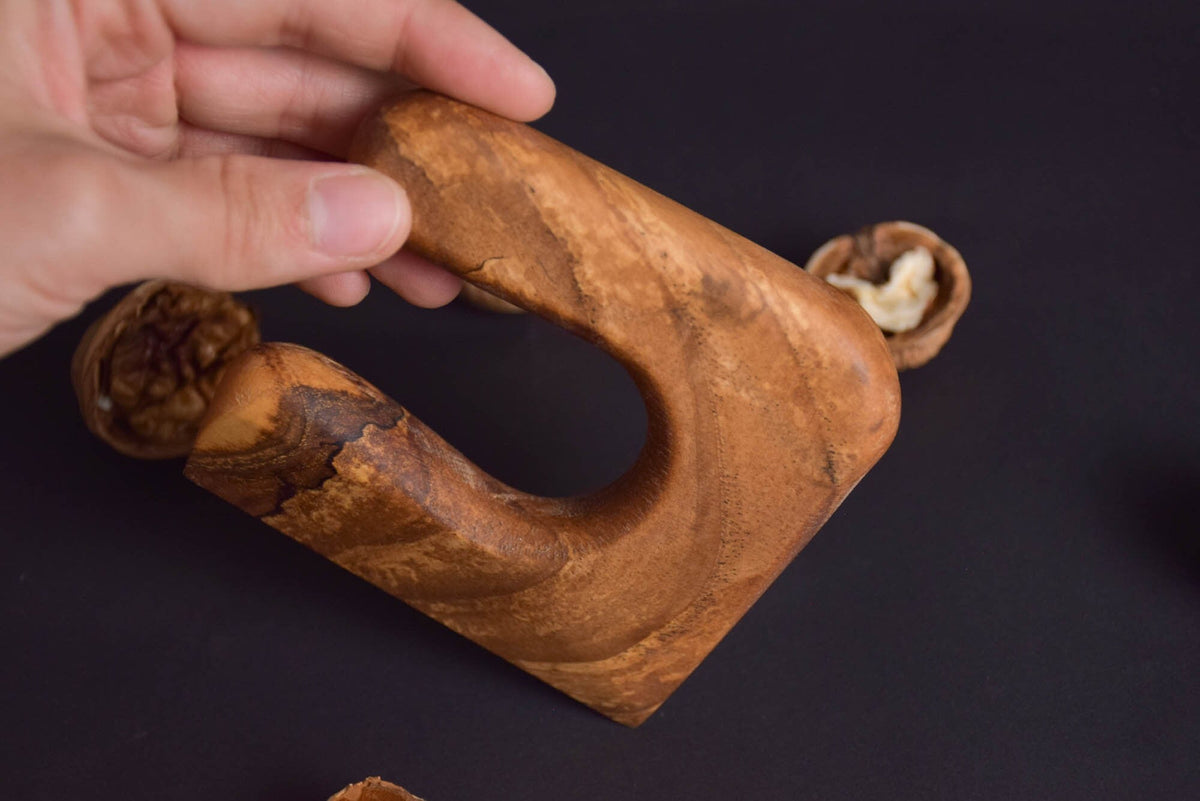 Handmade Montessori cutting knife in solid walnut wood with a natural oil finish