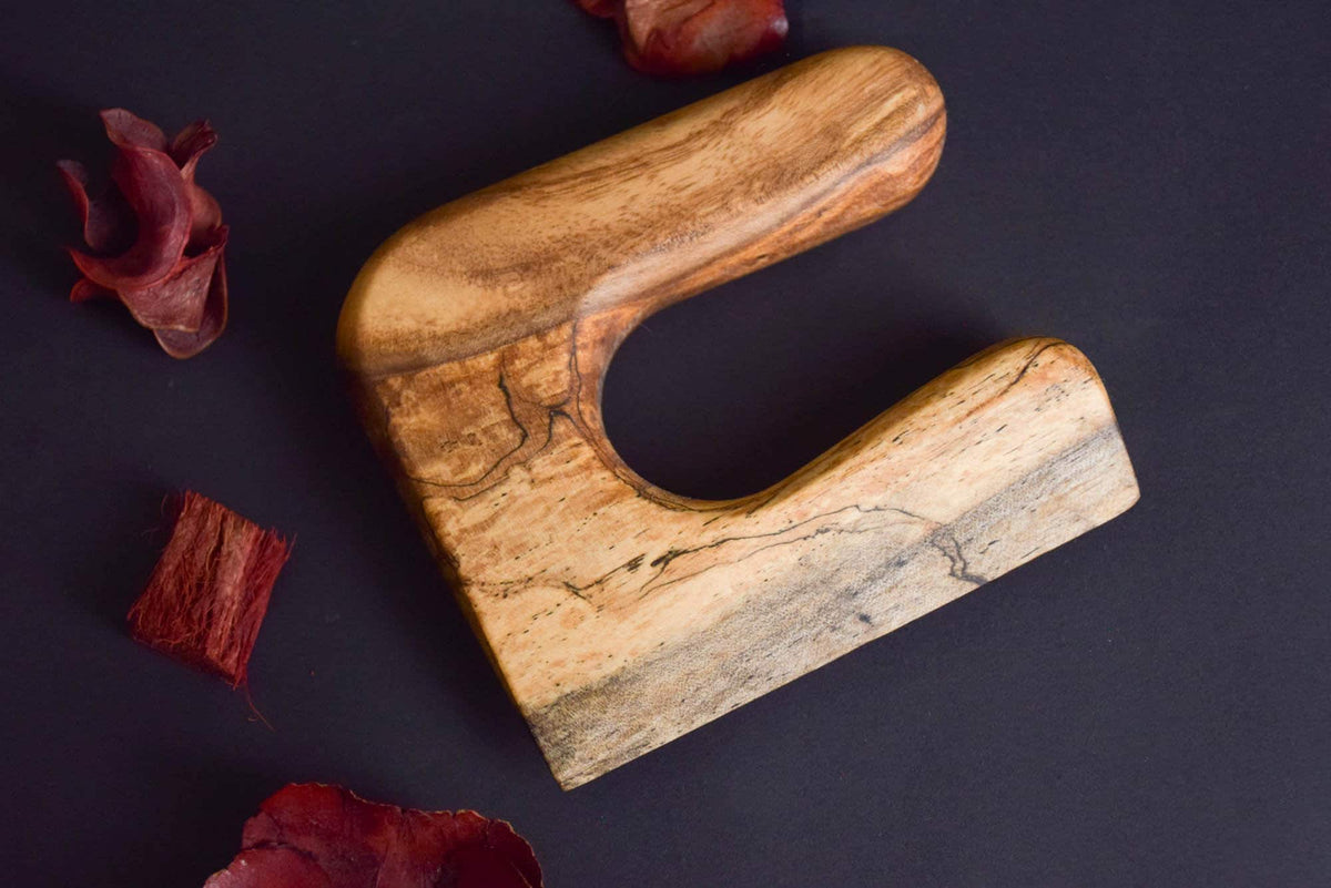 Handmade Montessori cutting knife in solid walnut wood with a natural oil finish