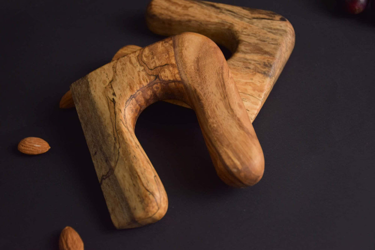 Handmade Montessori cutting knife in solid walnut wood with a natural oil finish