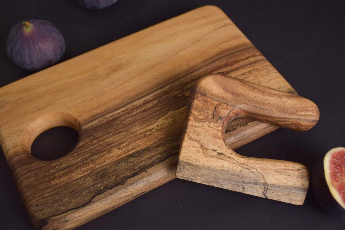 Handmade Montessori cutting knife in solid walnut wood with a natural oil finish