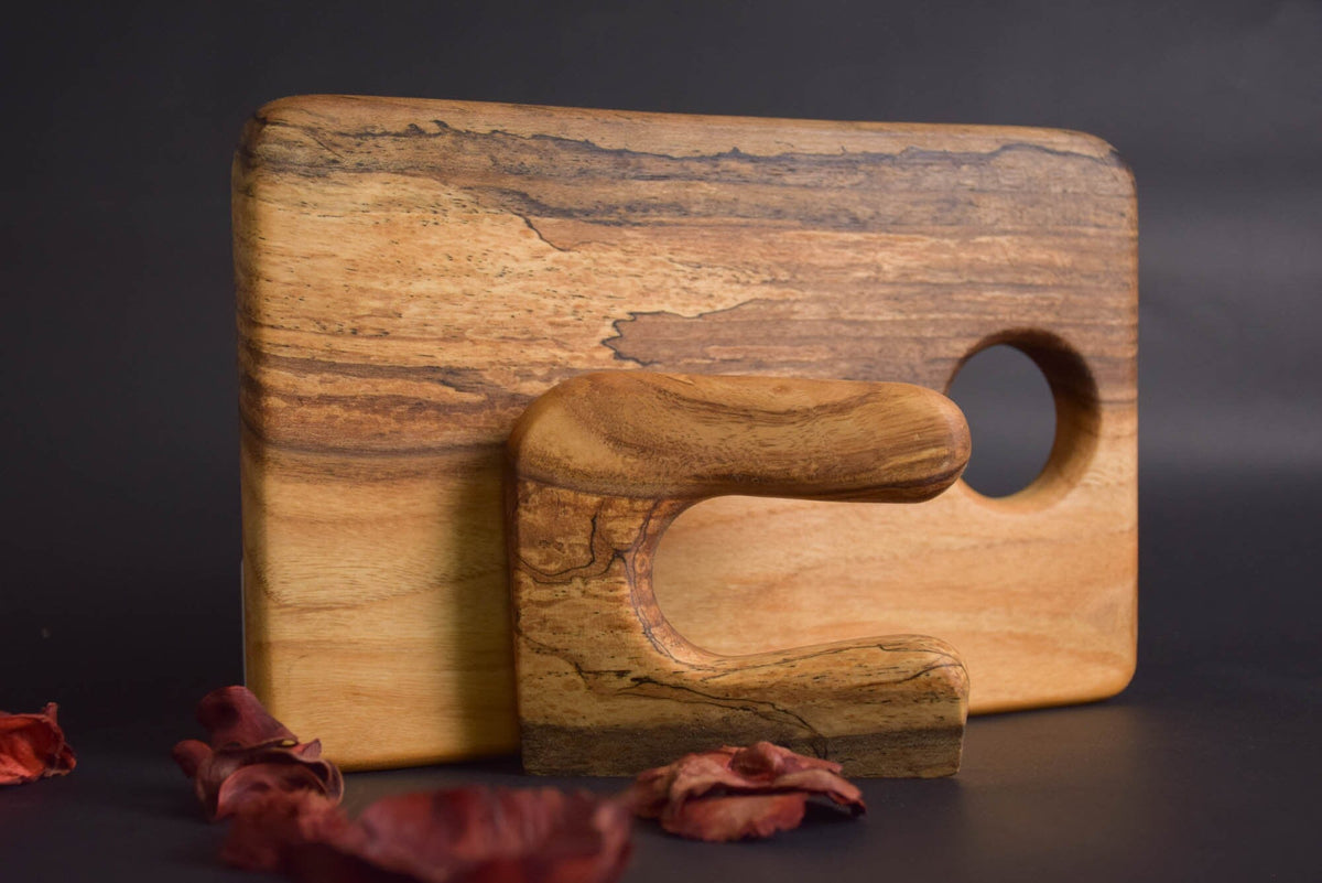 Handmade Montessori cutting knife in solid walnut wood with a natural oil finish