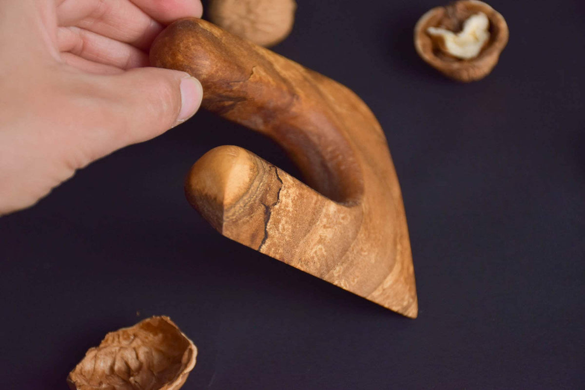 Handmade Montessori cutting knife in solid walnut wood with a natural oil finish