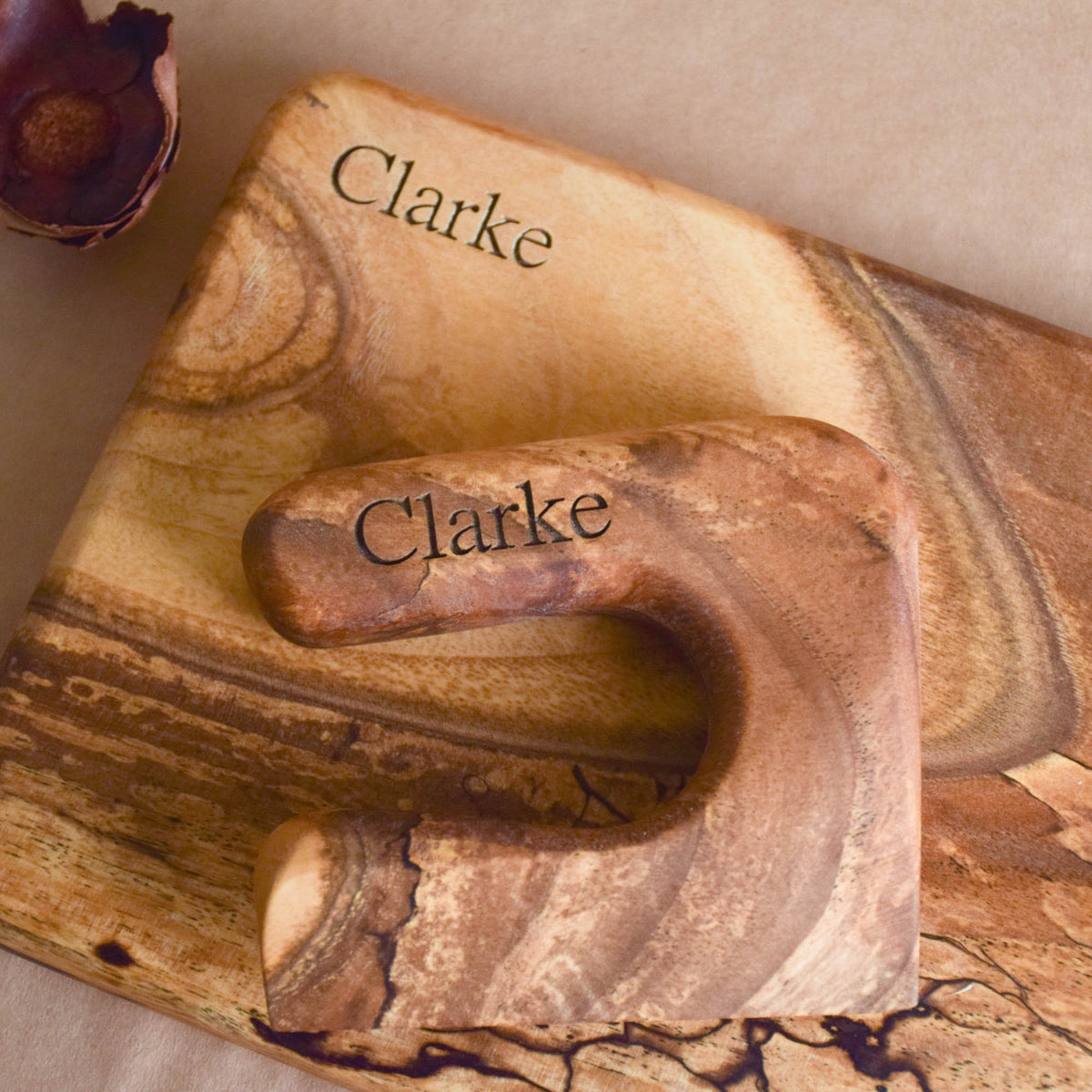 Handmade Montessori knife and cutting board set in solid walnut wood with a natural oil finish