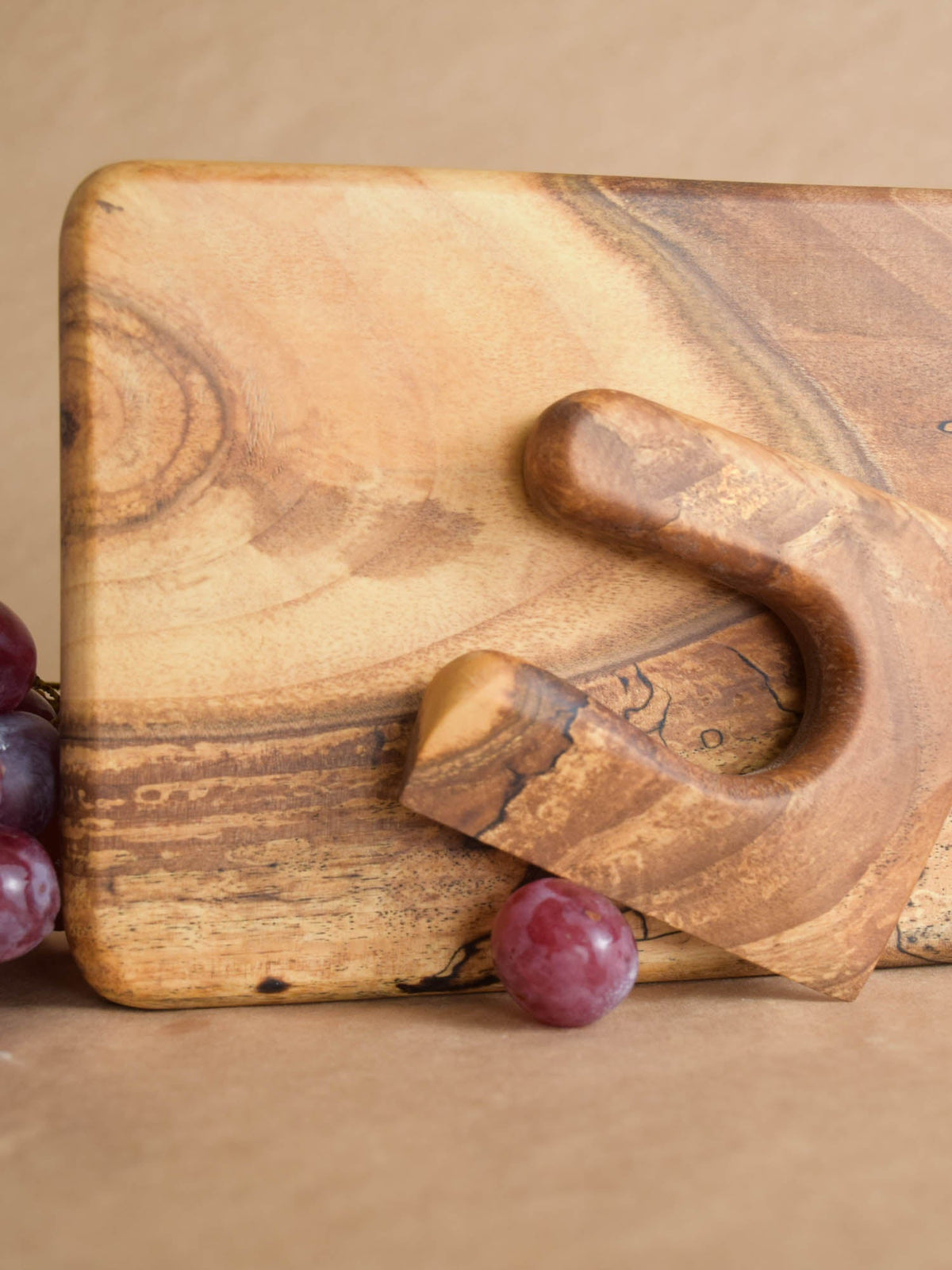 Handmade Montessori knife and cutting board set in solid walnut wood with a natural oil finish