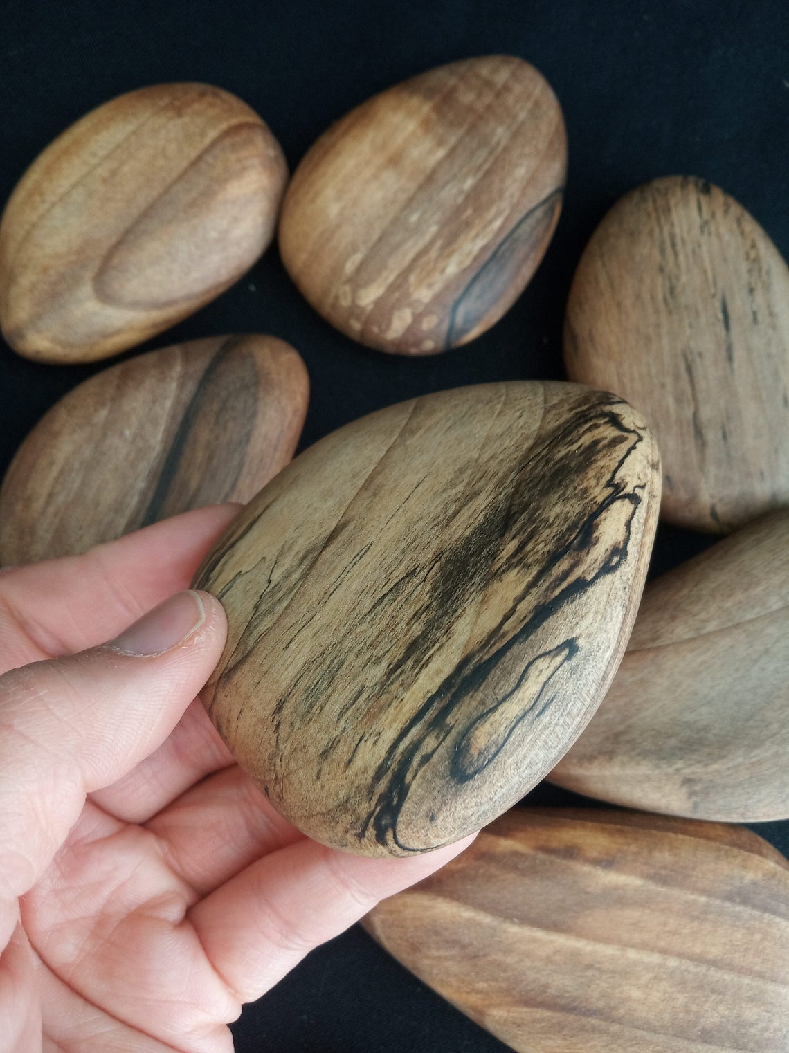 Smooth walnut wood stacking stones