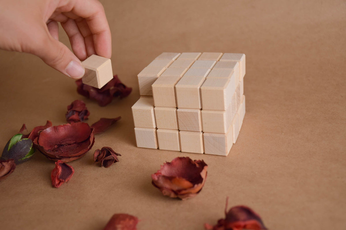 Wooden Blocks Set 0.7 in / 2 cm - 48 pcs featuring natural-toned counting wooden pieces for stacking, arranging, and building.