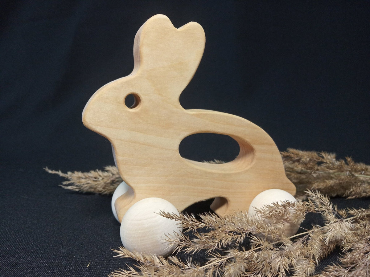 Wooden bunny push toy made from linden wood