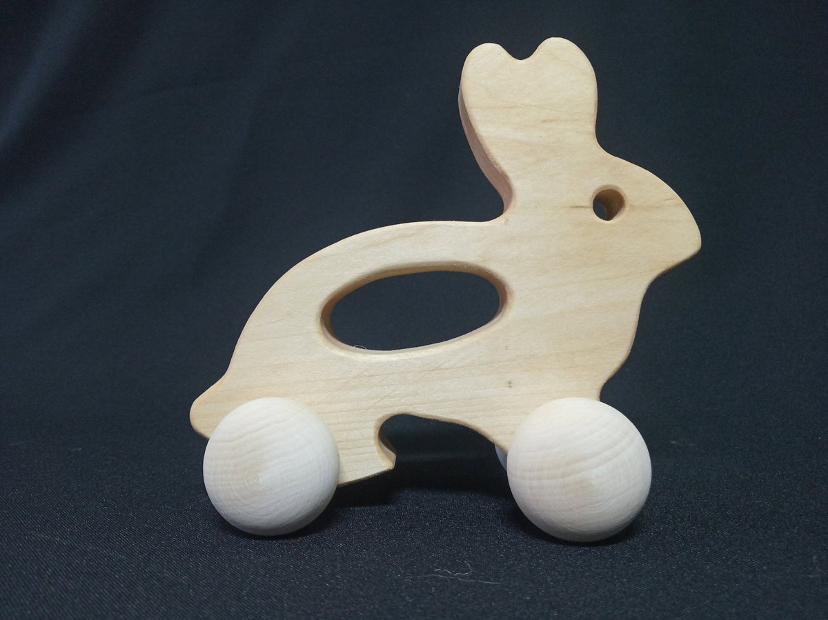 Wooden bunny push toy made from linden wood