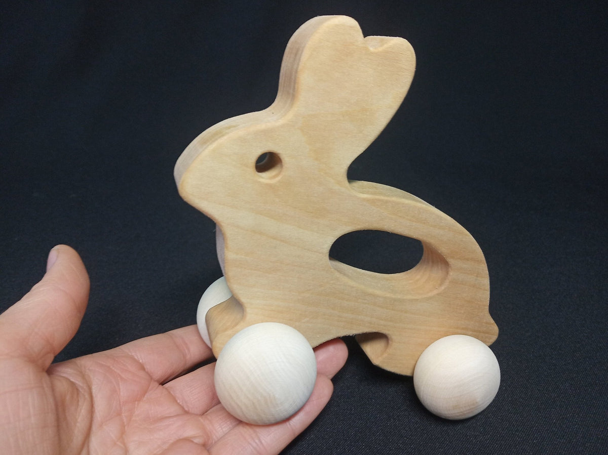 Wooden bunny push toy made from linden wood