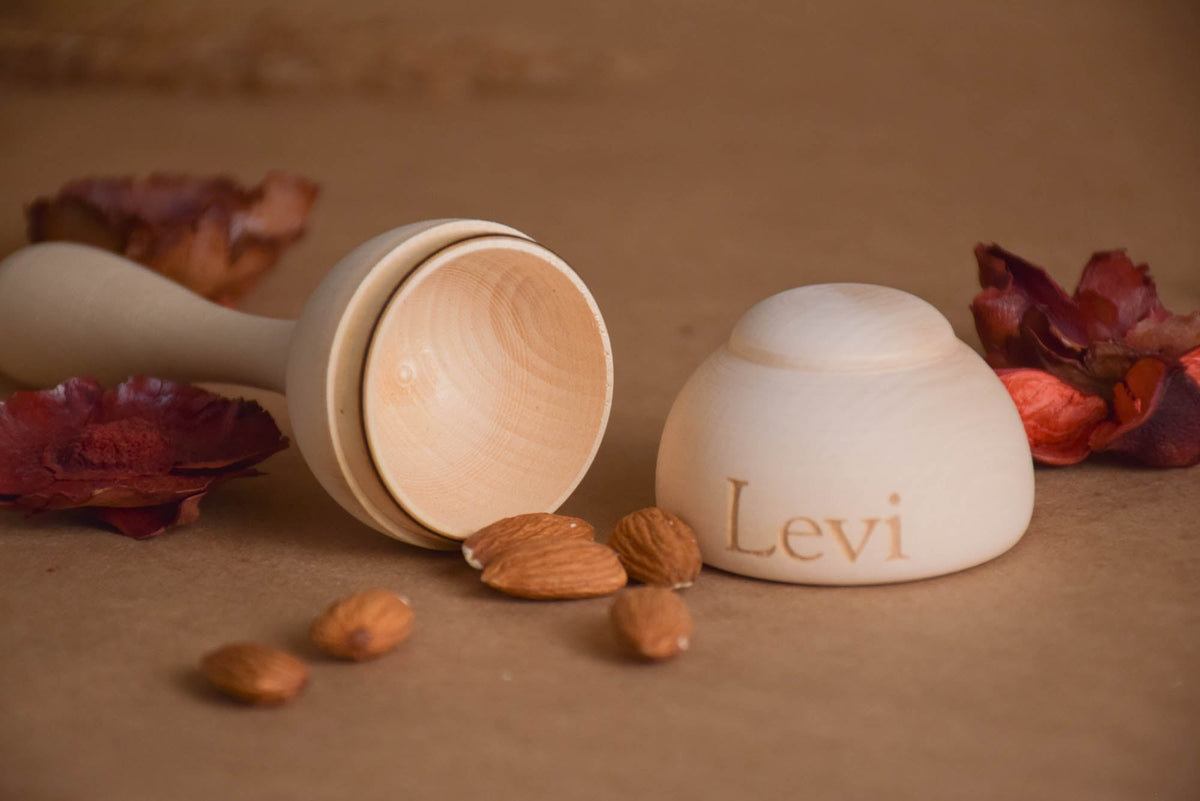 Wooden baby maraca rattle made from linden wood